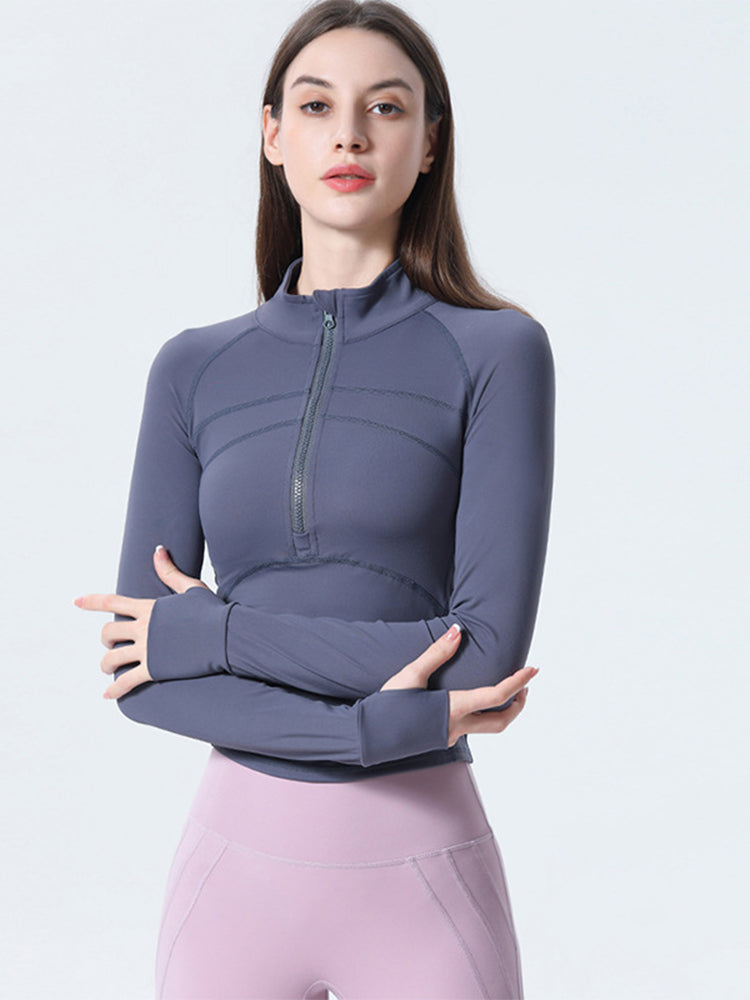 Haut de sport coupe slim à demi-zip pour femmes