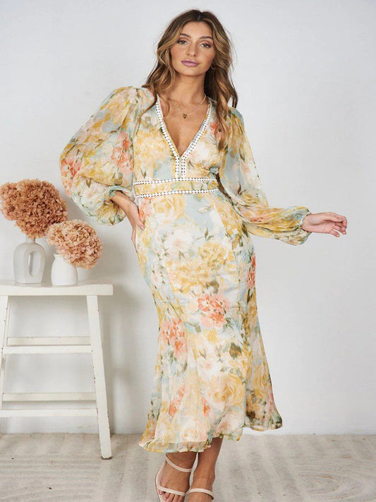 Robe mi-longue à manches longues avec imprimé floral