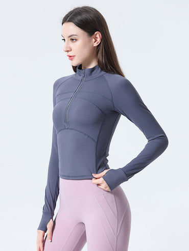 Haut de sport coupe slim à demi-zip pour femmes