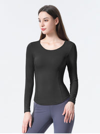 Dames sporttop met lange mouwen en patchwork mesh op de rug