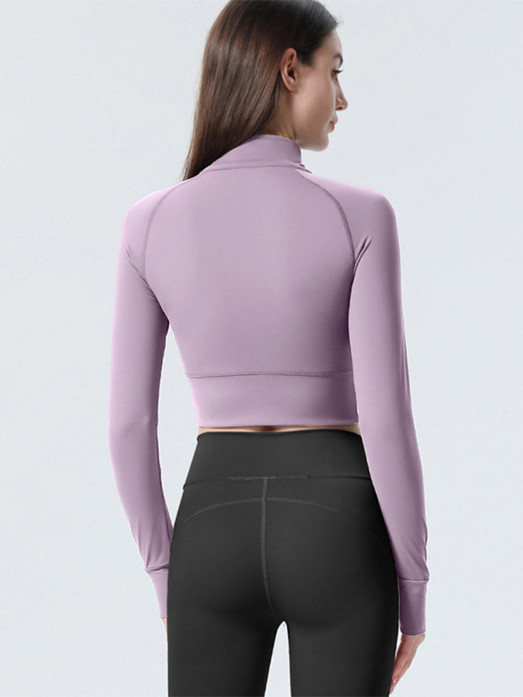 Haut de sport coupe slim à demi-zip pour femmes