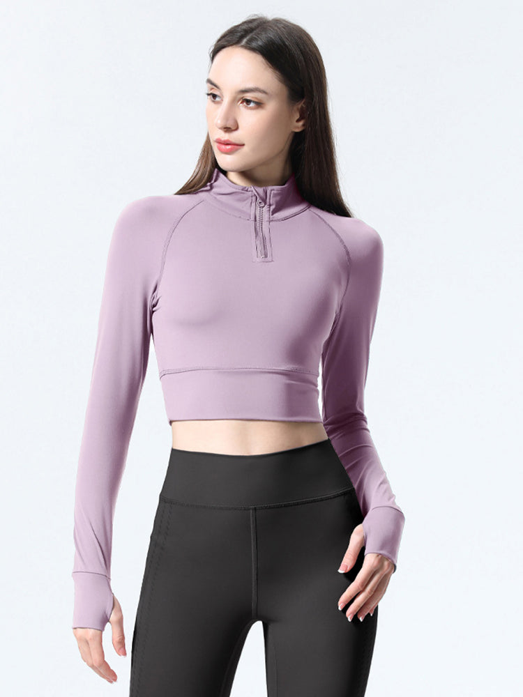 Haut de sport coupe slim à demi-zip pour femmes