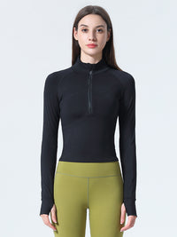 Haut de sport coupe slim à demi-zip pour femmes