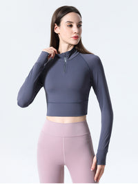 Haut de sport coupe slim à demi-zip pour femmes