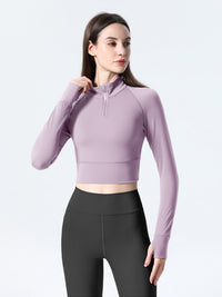 Haut de sport coupe slim à demi-zip pour femmes