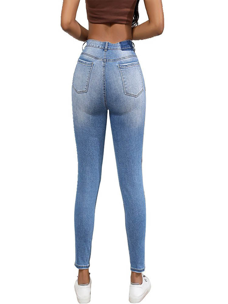 Enge Jeans mit unregelmäßigen Rissen und mittelhohem Bund für Damen